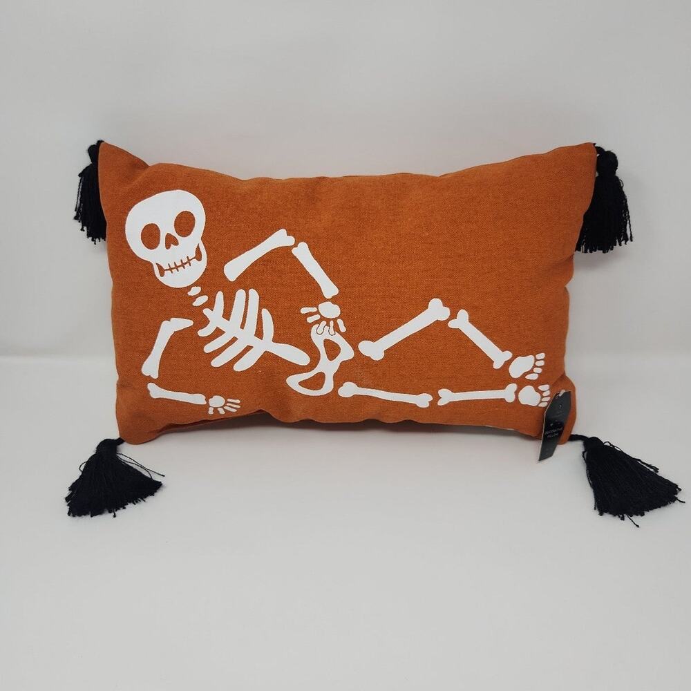 Orange Laying Skeleton Decor Pillow
